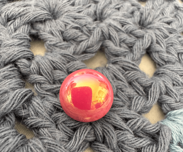Pin’s bille rose